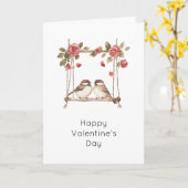 バレンタインデーのブランコに乗る愛の鳥たち カード (黄色い花)