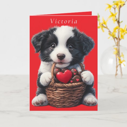 バレンタインデーの仔犬 赤いチョコレートのハート カード (黄色い花)