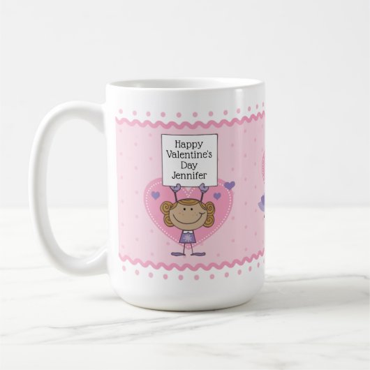 バレンタインデーを愛する愛の文字を掲げる少女 コーヒーマグカップ (左)