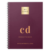 バーガンディーのイニシャルロゴビジネス ノートブック (正面)