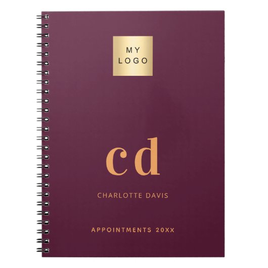 バーガンディーのモノグラムイニシャルビジネスロゴ ノートブック (正面)
