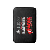 バーテンダーのサンタが見ている人に優しい バスマット (正面縦)