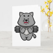 バーベルを使った上腕二頭筋トレーニング中の猫 カード (黄色い花)