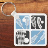 パウダーブルーのラクロスブロックの棒とボール キーホルダー (正面)