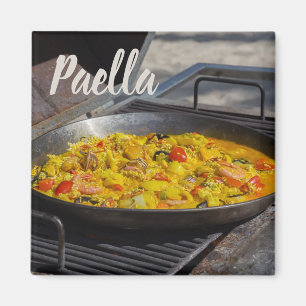 パエラは料理人のためのグリルの贈り物で調理される マグネット