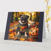 パグ犬がハロウィーンを過ごす カード (黄色い花)
