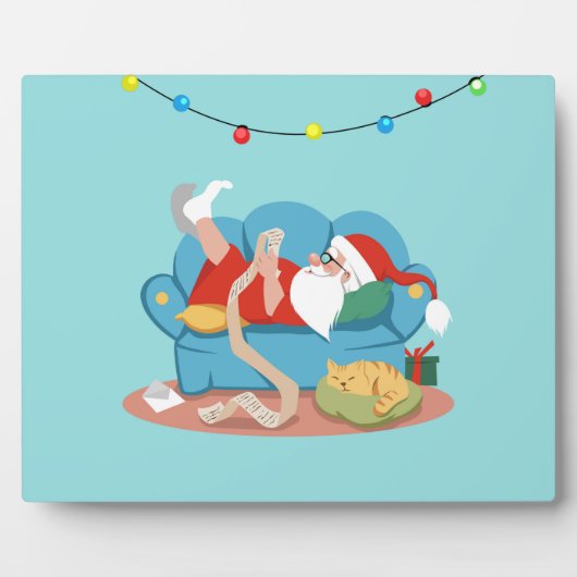 パジャマのソファのサンタクロース フォトプラーク (正面)