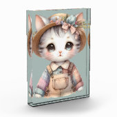 パステルカラーのコテージコアの猫ちゃんがオーバーオールと麦わら帽子を被っている フォトブロック (左)