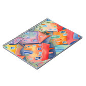 パステルカラーの小さな家が柔らかな色合いで、穏やかな雰囲気 ノートブック (左側)