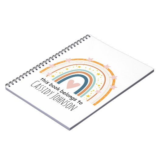 パステルカラーの虹色のこのノートは子供のもの ノートブック (左側)