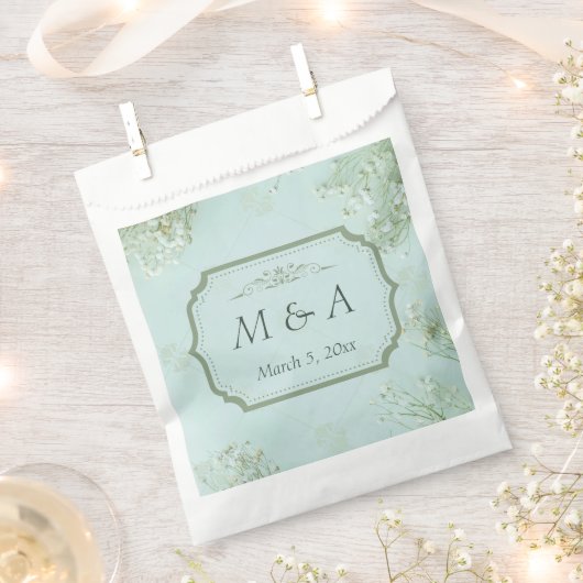 パステルティール（緑がかった色）ホワイトフラワ結婚ーズ フェイバーバッグ (クリップ留めされた状態)