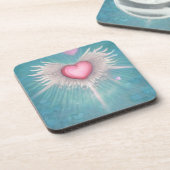 パステルピンクの翼付きハート コースター (左側)