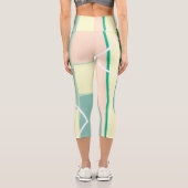 パステル淡い色のターコイズピンク抽象芸術アートライン カプリレギンス (裏面)