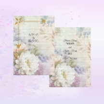 パステル紫と青のアクセントが付いた白いダリア