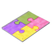 パズルは明るいノートを継ぎ合わせます ノートブック (左側)