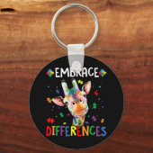 パズル片自閉症キリンが違いを受け入れる キーホルダー (正面)