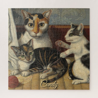 パズル キャンディと遊び心のある子猫の絵画