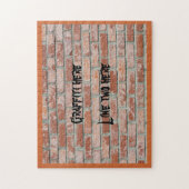 パズル – レンガ壁のグラフィティ (縦)