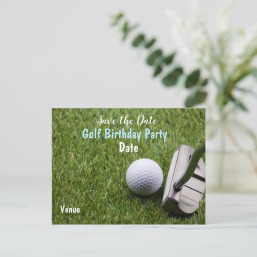 パター付きゴルフボールが緑の草の上にある 案内ポストカード (スタンド正面)
