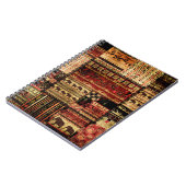 パッチワークのアフリカパターングランジプリントの背景 ノートブック (左側)