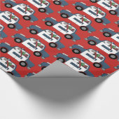 パトカーのパーティーの覆いを運転するおもしろいサンタ ラッピングペーパー (角)