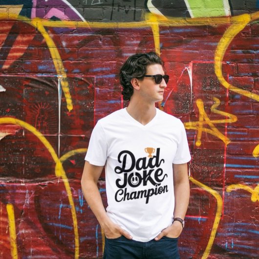 「パパのジョークのチャンプ:父の日のトロフィー Tシャツ