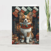 パピヨンの犬とクリスマスプレゼントの暖炉 カード (正面)