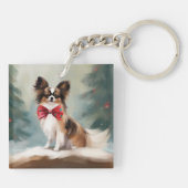 パピヨンの犬の雪のクリスマス キーホルダー (裏面)