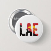 パプアニューギニア国旗を掲げる 缶バッジ (正面&裏面)