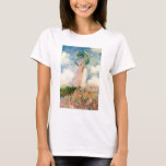 パラソルのTシャツを持つMonetの女性 Tシャツ<br><div class="desc">パラソルのTシャツを持つMonetの女性。 1886年からのキャンバスのテンペラ。 印象派のクロード・モネのフランスのな最も顕著な勉強の1つは、パラソルを持つ女性熱い夏の微風の彼女の青いスカーフの打撃として緑パラソルを握る赤いコサージュが付いている白い服に立っている美しい女性を特色にします。 雲として風で吹く彼女の後ろで彼女のスカートが付いている草が茂った吹きさらしの丘の女の子の立場は明るく渡ります。 クロード・モネ、印象主義およびフランスのな芸術のファンのためのかわいらしい芸術のギフト。</div>