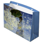 パラソルを持った女性の歩き ラージペーパーバッグ (裏面アングル)