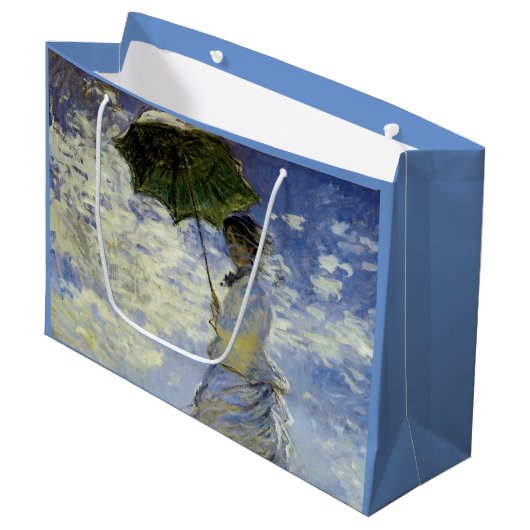 パラソルを持った女性の歩き ラージペーパーバッグ (正面アングル)