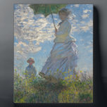 パラソル1875年を持つクロード・モネの女性 フォトプラーク<br><div class="desc">パラソルを持つ女性、(カミーユおよびジーンMonet)、1875年</div>