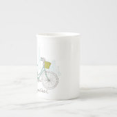 パリのかわいいバスケットが付いているヴィンテージの自転車 ボーンチャイナマグカップ (正面)