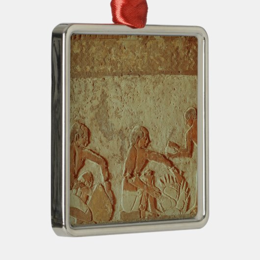 パンの作り、焼けることを描写するレリーフ、浮き彫り メタルオーナメント (右)