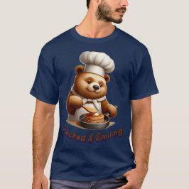 パンをひっくり返すクマのシェフ "積み重ねて笑顔" Tシャツ