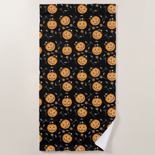 パンプキントリックまたはトリートバケットハロウィン棒つきキャンデー ビーチタオル (正面)
