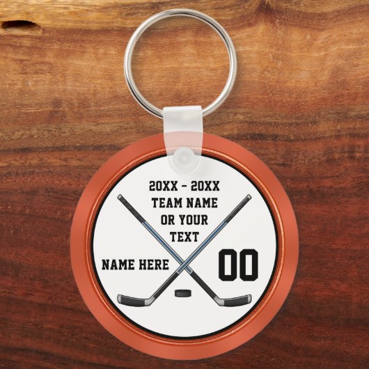 パーソナライズされたブラック、オレンジの安いホッケーパーティーギフト キーホルダー (正面)