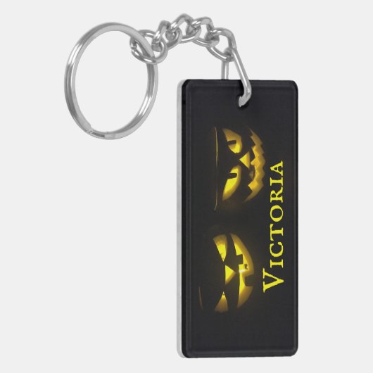 パーソナライズされた不気味な黄色いカボチャ顔 キーホルダー (正面左)