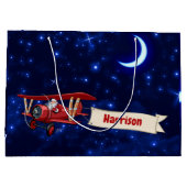 パーソナライズされた赤い飛行機とサンタ、メリークリスマス ラージペーパーバッグ (裏面)