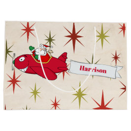 パーソナライズされた赤い飛行機とサンタ、メリークリスマス ラージペーパーバッグ