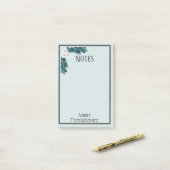 パーソナライズなエレガントで白いRanunculus及び群葉 ポストイット (デスク上)