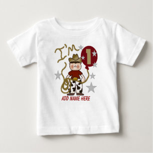 パーソナライズなカウボーイの第1誕生日のTシャツ ベビーTシャツ