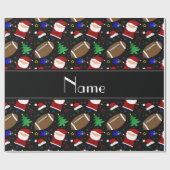 パーソナライズな一流の黒いフットボールのクリスマス ラッピングペーパー (フラット)