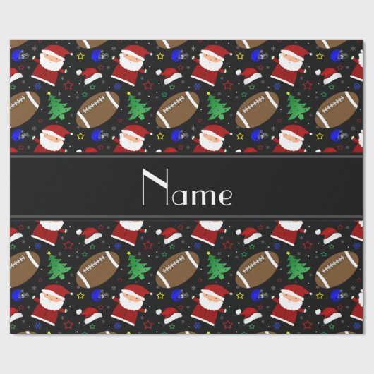 パーソナライズな一流の黒いフットボールのクリスマス ラッピングペーパー (フラット)