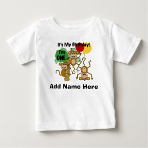 パーソナライズな猿の輝やきの第1誕生日のTシャツ ベビーTシャツ