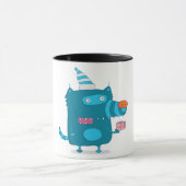 パーティーハットをかぶった青いキャルトゥーンのモンスター マグカップ (中央)