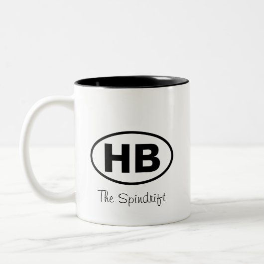 ヒギンズビーチ2文字楕円コテージ名 ツートーンマグカップ (左)