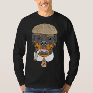 ヒップスターの犬のロットワイラーは、茶色の帽子に入って Tシャツ