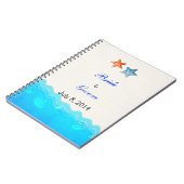 ヒトデの結婚式の来客名簿が付いているビーチ ノートブック (左側)